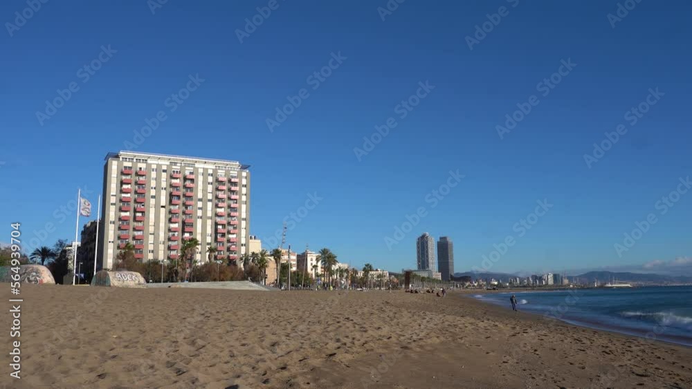 Barcelonetta Beach with Building Blocks on a Sunny Day (4K) Barcelonetta Beach with Building Blocks on a Sunny Day (4K)
