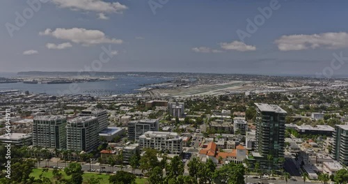 San Diego California Aerial v65 drone flyover balboa park capturing airplane landing at the airfield of international airport by the bay on a sunny day - Shot with Mavic 3 Cine - September 2022 photo