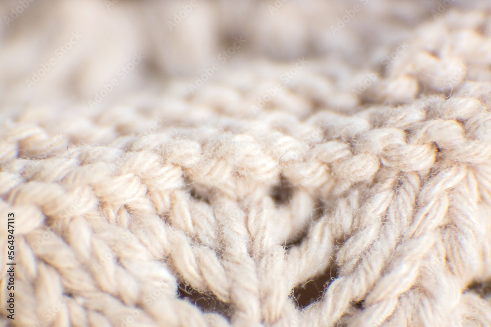 Textured background made with fabric mesh picked up in detail, close up. Textured background made with fabric mesh picked up in detail, close up.