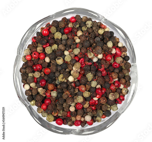 Colorful mixed pepper grains in glass bowl isolated on white background, top view