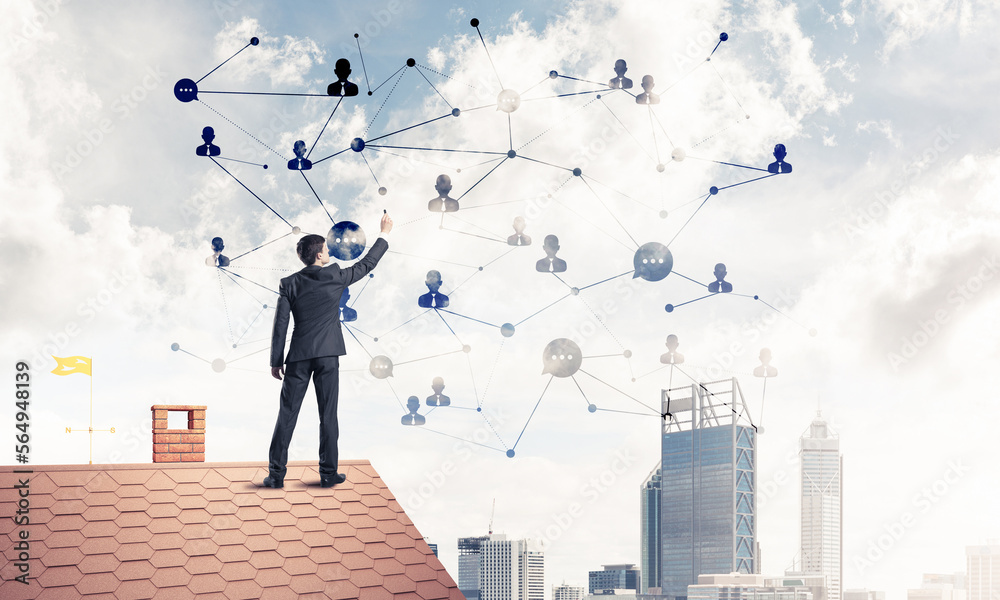 Businessman on house roof presenting networking and connection c Businessman on house roof presenting networking and connection c