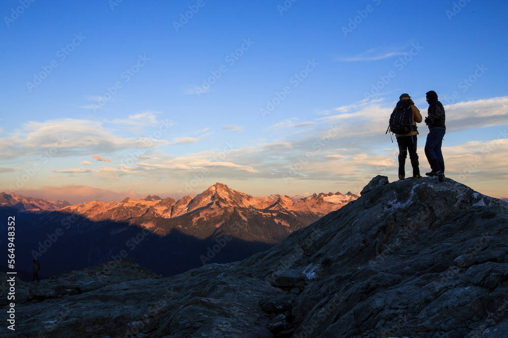 Silhouettes of mountain climbers on Mount Shuksan, North Cascades National Park, Washington State, USA Silhouettes of mountain climbers on Mount Shuksan, North Cascades National Park, Washington State, USA