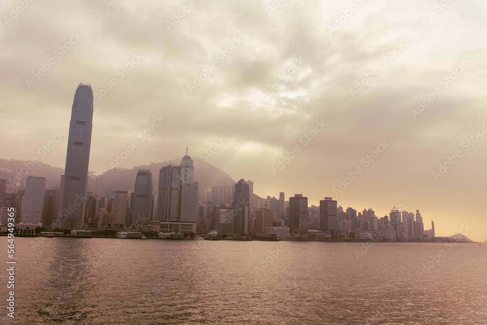Hong Kong city skyline at sunset, vintage style