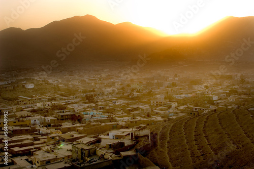 View of the city of Kabul from the Hill of Nader Khan, at sunset. photo