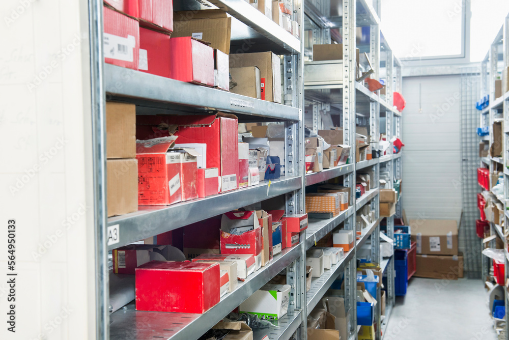 Interiors of warehouse with goods on shelves, Munich, Bavaria, Germany Interiors of warehouse with goods on shelves, Munich, Bavaria, Germany