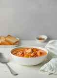 bowl of salmon and tomato soup