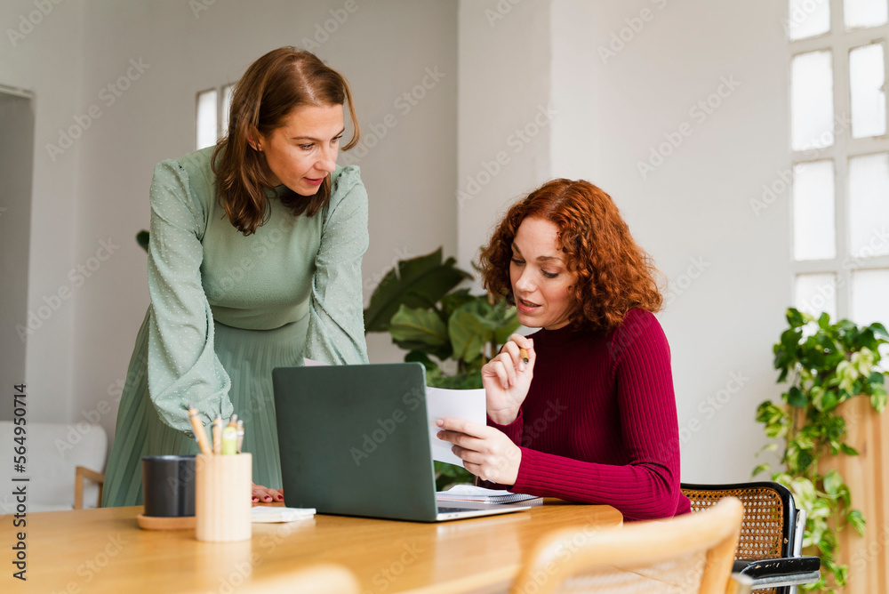 Woman Working Together In Modern Office Woman Working Together In Modern Office