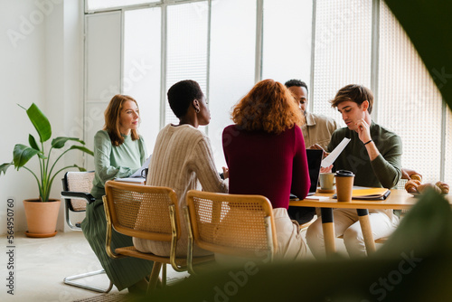 Diverse People Working Together In Modern Office