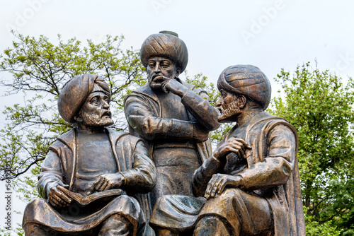 Memorial of Fatih Sultan Mehmed II the Conqueror. Three sages. Close up view, fragment of composition. Turkish monuments of the history of Constantinople. Fatih Park, Istanbul, Turkey (Turkiye)