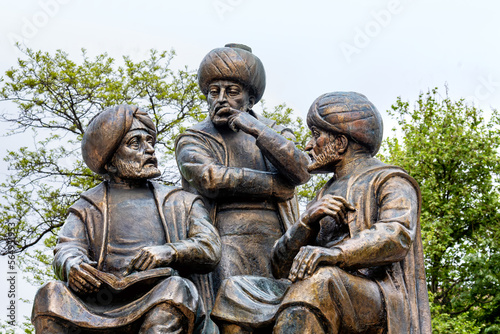 Memorial of Fatih Sultan Mehmed II the Conqueror. Three sages. Close up view, fragment of composition. Turkish monuments of the history of Constantinople. Fatih Park, Istanbul, Turkey (Turkiye) photo