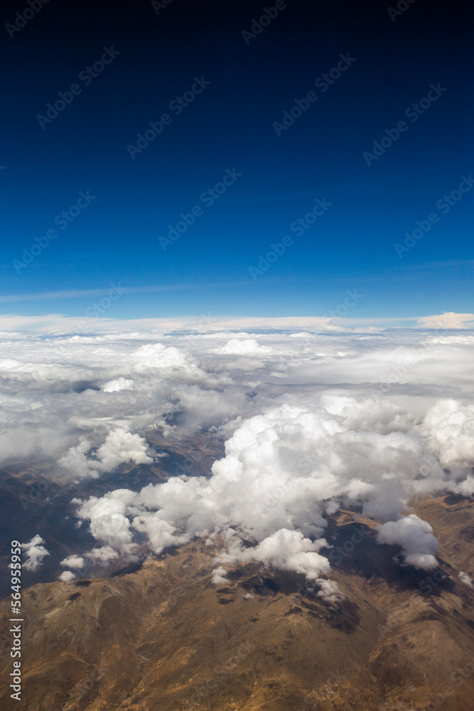 Aerial View - Clouds over Andes Mountains in Cusco, Peru Aerial View - Clouds over Andes Mountains in Cusco, Peru
