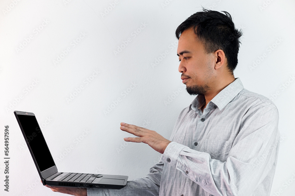 Handsome young ambitious developer working alone at the office Handsome young ambitious developer working alone at the office
