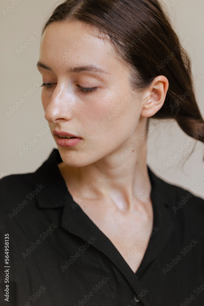 Portrait Of A Brunette Woman In Black Shirt Portrait Of A Brunette Woman In Black Shirt