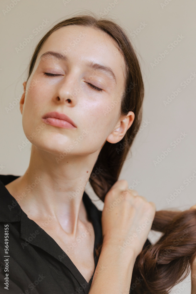 Portrait Of A Brunette Woman In Black Shirt Portrait Of A Brunette Woman In Black Shirt