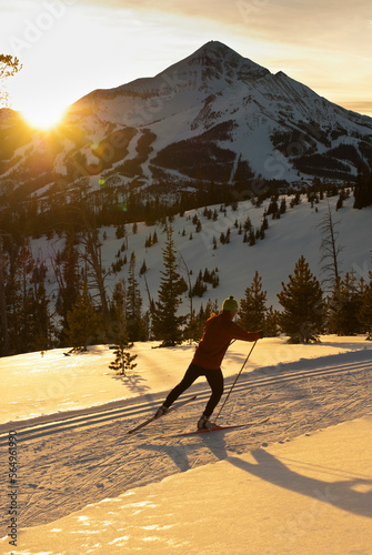 A young man nordic skate skis at Lone Mountain Ranch in Big Sky, Montana. photo