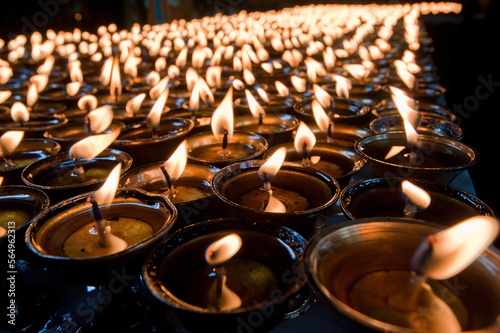 Prayer candles in a Bhuddist Temple, Kathmandu, Nepal. photo