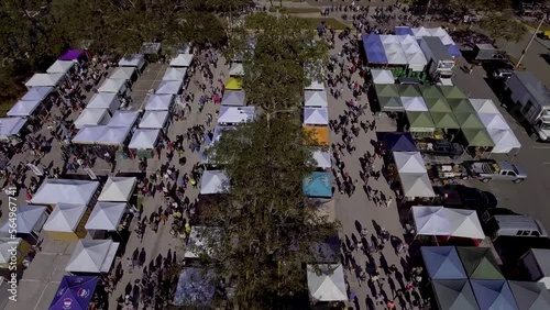 4K Aerial Drone Video (High Speed) of Shoppers at Farmers Market in Downotwn St. Petersburg, FL photo