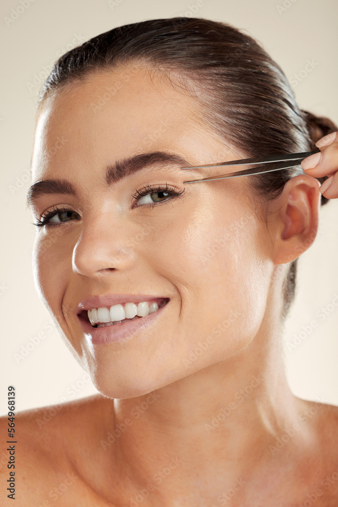 Beauty, face and woman portrait with tweezer for eyebrow cleaning or hair removal in studio. Happy aesthetic model with a smile for facial, cosmetic tools and clean skin for self care routine Beauty, face and woman portrait with tweezer for eyebrow cleaning or hair removal in studio. Happy aesthetic model with a smile for facial, cosmetic tools and clean skin for self care routine
