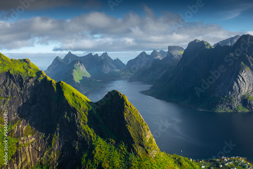 Amazing landscape of the Lofoten Islands from the top of Reinebringen Mountain with blue sky , Norway