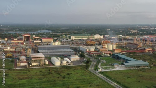 Aerial view capturing PGEO edible oil refinery food processing centre and sapura energy fabrication yard at lumut port industrial park, Kampung Acheh, Sitiawan, Perak, Malaysia. photo