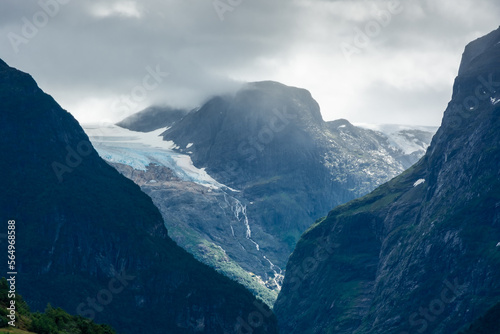 View of the Jostedalen Glacier melting over the Lovatnet Lake,  Norway photo