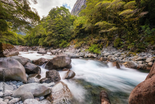 Hollyford river cascading through the mountains and rainforest of South Island  New Zealand  on Highway 94 to MIlford Sound