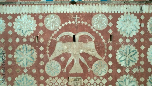 drone shot of the imperial eagle on the facade of the church of Uayma in mexico photo