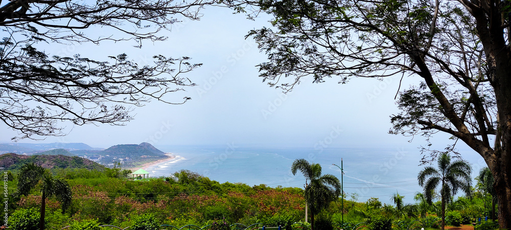 view of the ocean from the top of a mountain