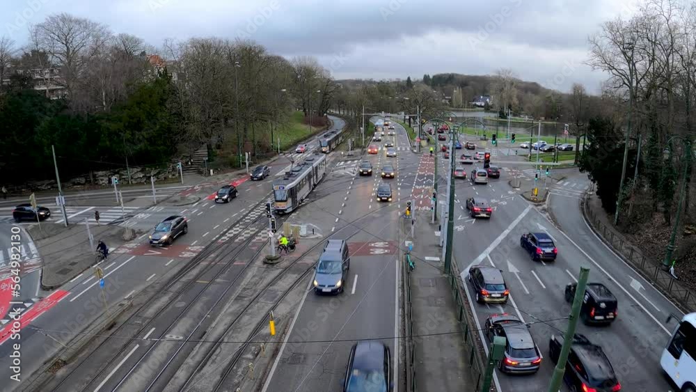 Busy traffic and public transport crossing intersection in Sint-Pieters-Woluwe - Brussels, Belgium