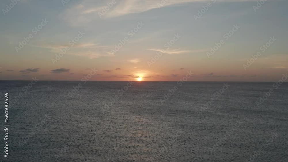 Experience the peaceful beauty of the ocean at sunset with our stunning video of the seascape. Watch the sun dip below the horizon and the sky burst into oranges and blues. Experience the peaceful beauty of the ocean at sunset with our stunning video of the seascape. Watch the sun dip below the horizon and the sky burst into oranges and blues.