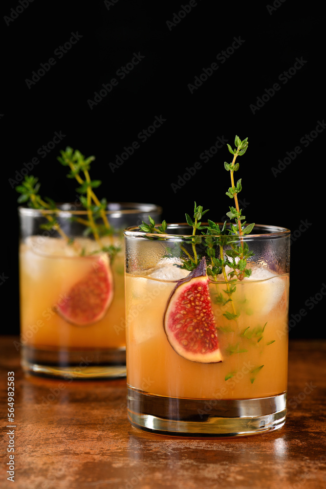 Bourbon Sour cocktail with fig spices, lemon juice and syrup. Easy to make but so delicious. Garnish with figs and thyme. Bourbon Sour cocktail with fig spices, lemon juice and syrup. Easy to make but so delicious. Garnish with figs and thyme.