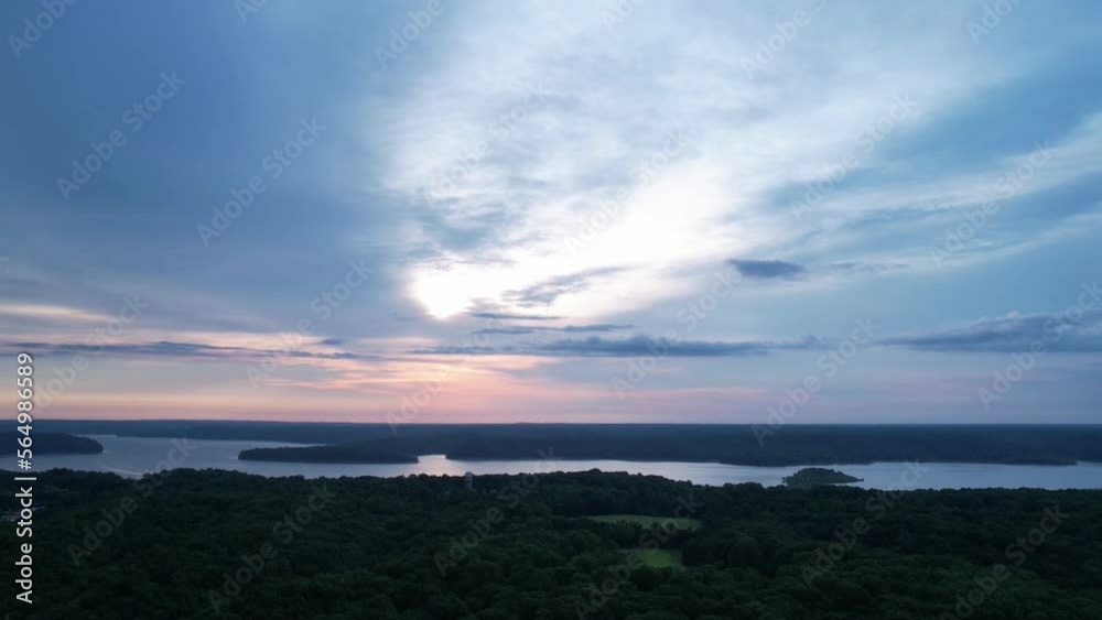 Aerial time lapse of brooding clouds speeding over Lake Monroe in Indiana. Aerial time lapse of brooding clouds speeding over Lake Monroe in Indiana.