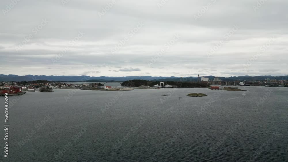 Stavanger port with Pyntesundbrua bridge between islands of Engoy and Buoy, Norway. Aerial forward and sky for copy space Stavanger port with Pyntesundbrua bridge between islands of Engoy and Buoy, Norway. Aerial forward and sky for copy space