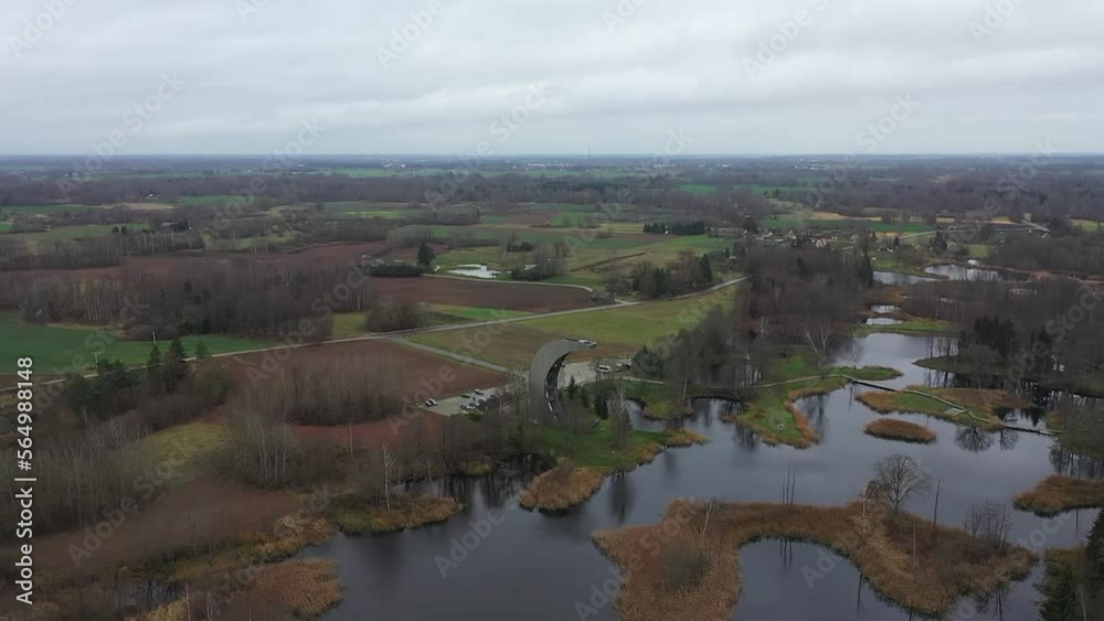 Soaring above the watchtower, the drone captures breathtaking views of the many lakes surrounded by autumn colors. Soaring above the watchtower, the drone captures breathtaking views of the many lakes surrounded by autumn colors.