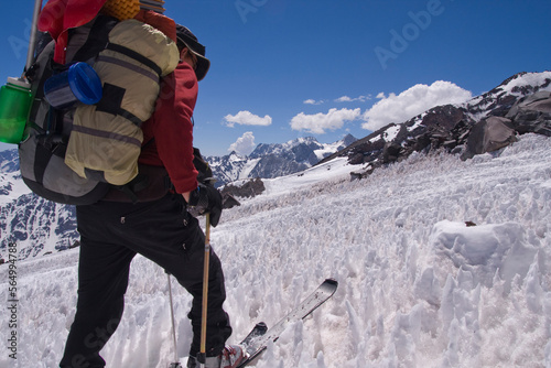 A man ski mountaineering through penitentes on Volcan San Jose in the Andes mountains of Chile photo