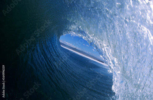 Santa Ana Winds blow the lip of this wave open in Ventura, California. (fisheye) photo