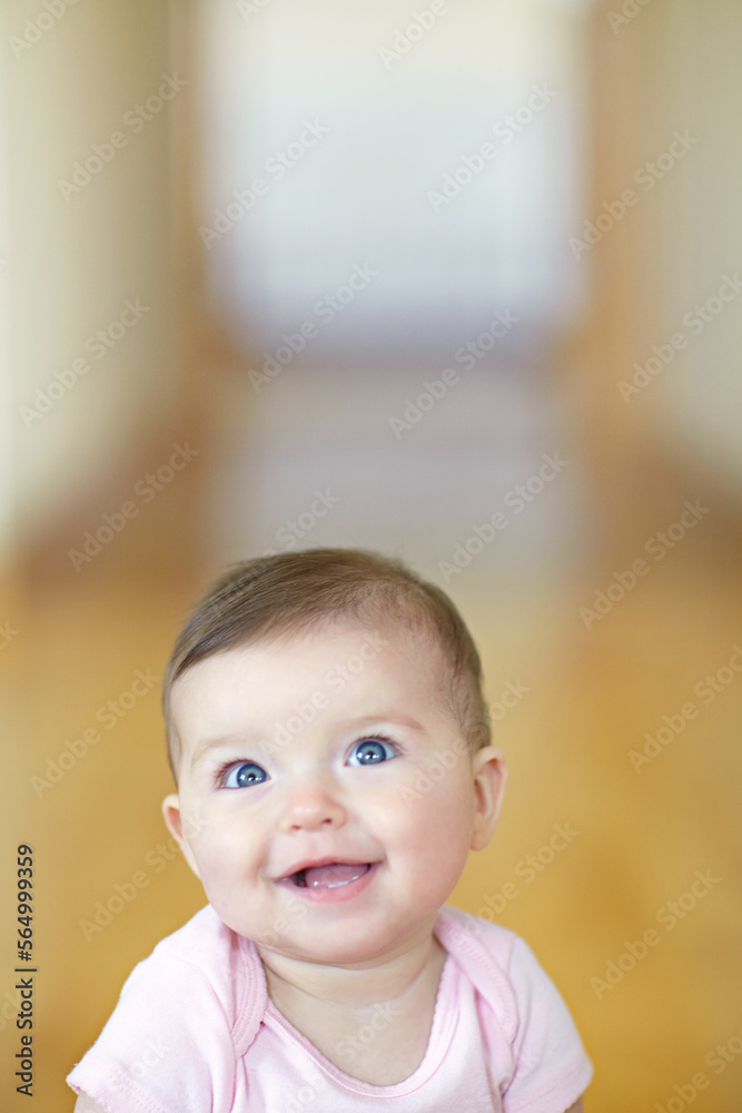 Baby, mockup and growth with an adorable girl child looking curious in her home alone for development. Face, smile or mock up and a cute female infant with blue eyes in a house feeling happy Baby, mockup and growth with an adorable girl child looking curious in her home alone for development. Face, smile or mock up and a cute female infant with blue eyes in a house feeling happy
