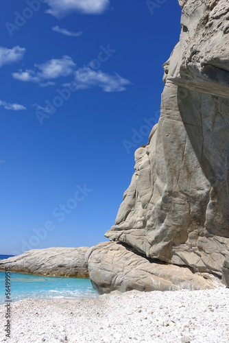 Beautiful paradise turquoise pebble beach of Seychelles in island of Ikaria, North Aegean sea, Greece photo