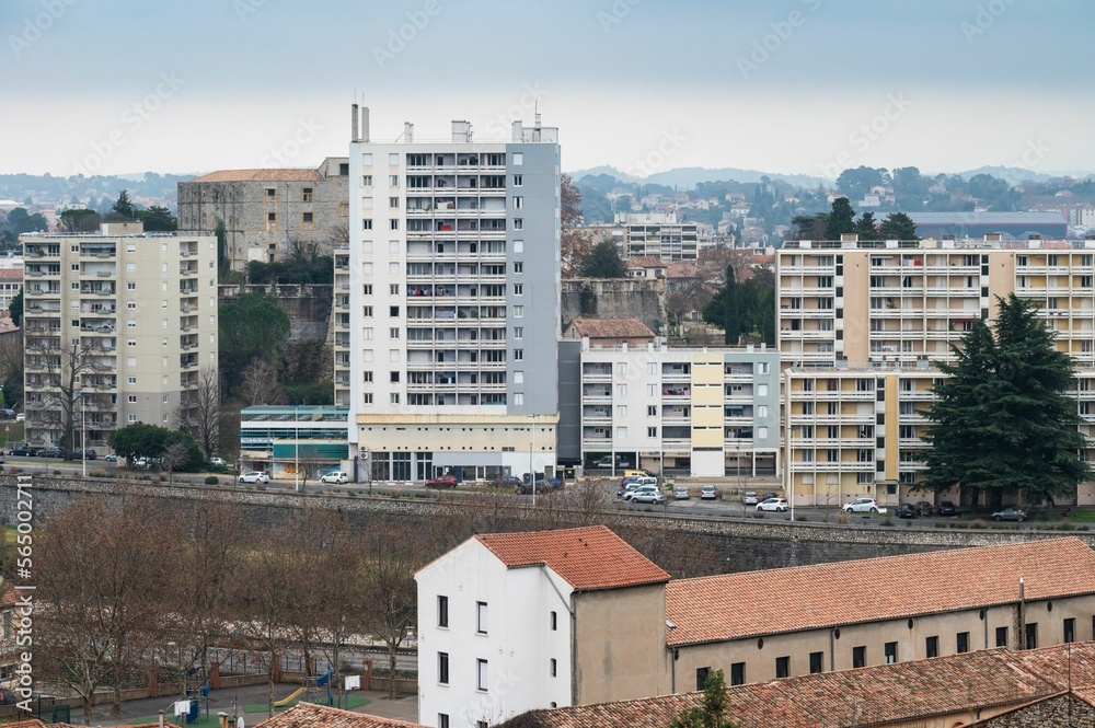 Ales, Occitanie, France, Contemporary apartment blocks at the banks of the river Gardon