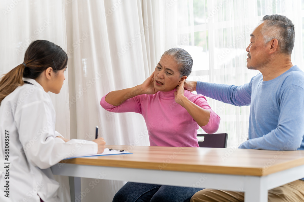 Senior couple see a doctor with headache Senior couple see a doctor with headache