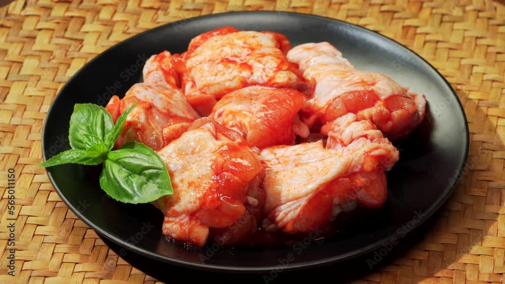 The process of making fried Orleans chicken thighs The process of making fried Orleans chicken thighs