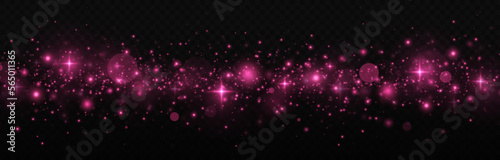 Pink dust, sparks and pink stars. Christmas abstract stylish light effect. The dust sparks and pink stars shine with special light.