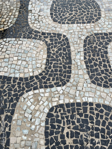 Floor of black and white Portuguese stones with drawings of Rio de Janeiro