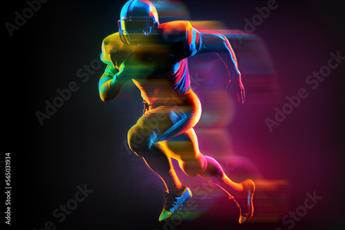 Silhouette of a running american football player with motion blur effect. Created with Generative AI technology. © Boris Znaev