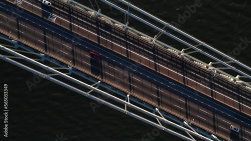 Aerial view over cars on the Verrazzano-Narrows Bridge, in NY, USA - cenital, drone shot photo