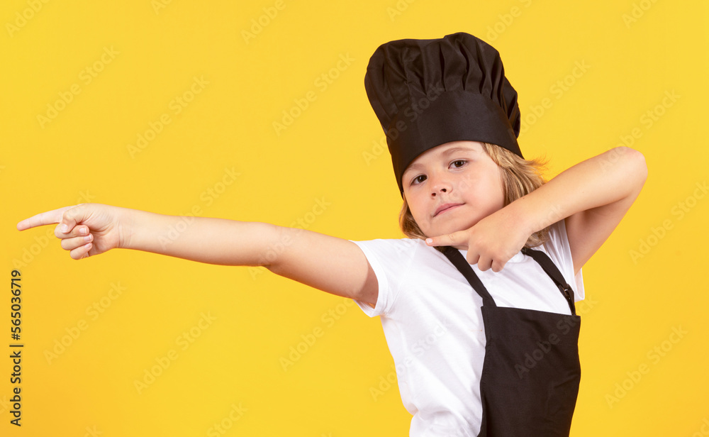 Excited chef cook. Child wearing cooker uniform and chef hat preparing food, studio portrait. Excited chef cook. Child wearing cooker uniform and chef hat preparing food, studio portrait.