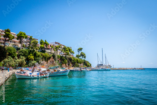 Yachts moored up in the port of the Greek island of Alonissos, Sporades, Greece