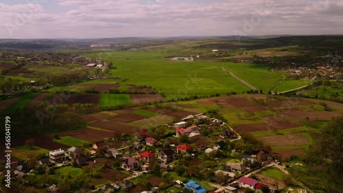 Magdacesti,  Republic of Moldova, village and fields Aerial Shot overseeing horizon. photo