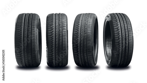 Car tires with a great profile in the car repair shop.  Set of summer or winter tyres in front of white fond. On transparent white background.