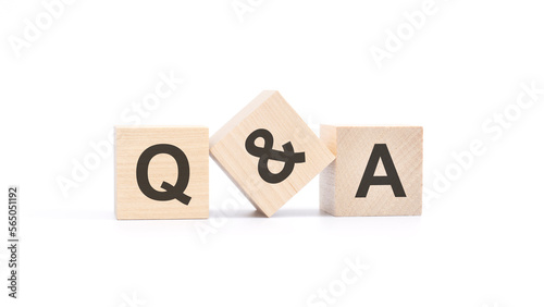 Q and A - acronym from wooden blocks with letters, Question and Answer concept, top view on white background